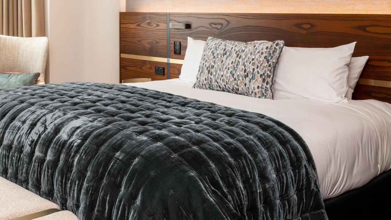 Horizon By Skycity Auckland Extérieur photo A bed with a throw